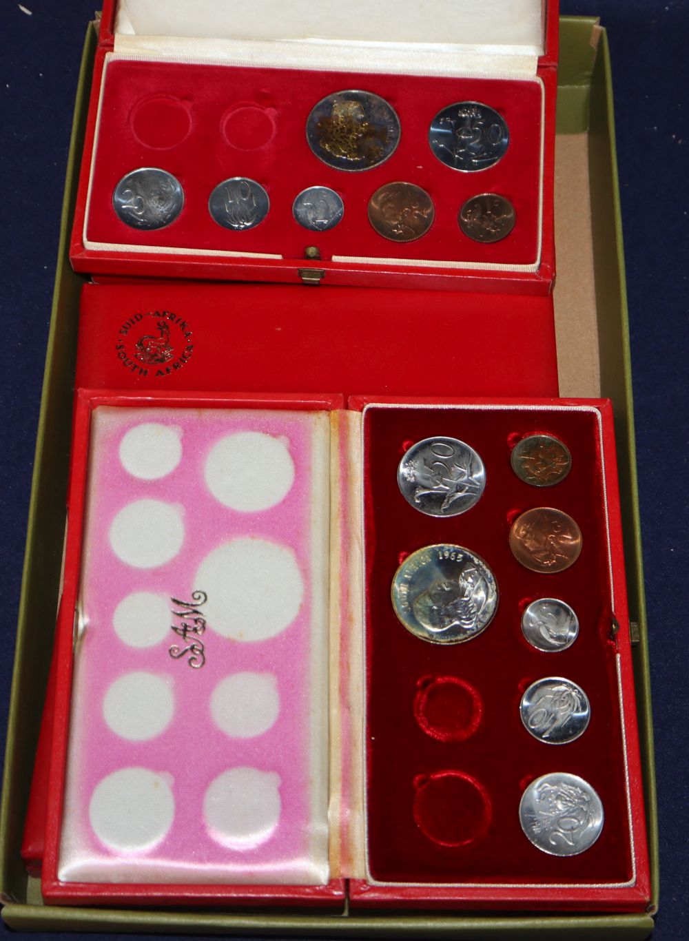 A group of South African 7 coin boxed proof sets, 1 rand to 1 cent 1965, 66, 67, 68 and 69